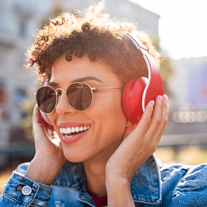 Young smiling girl listening songs