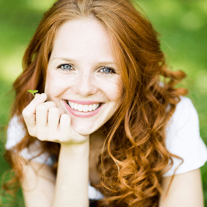 Healthy shiny toothy woman's smile