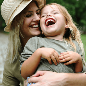 Mother hugging her daughter