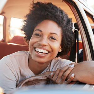 Mother and Children relaxing in car during road trip